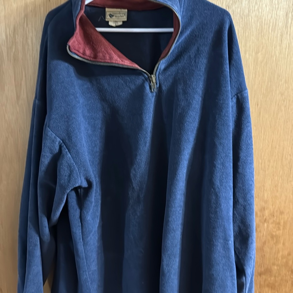 This is a green brand recycling shirt